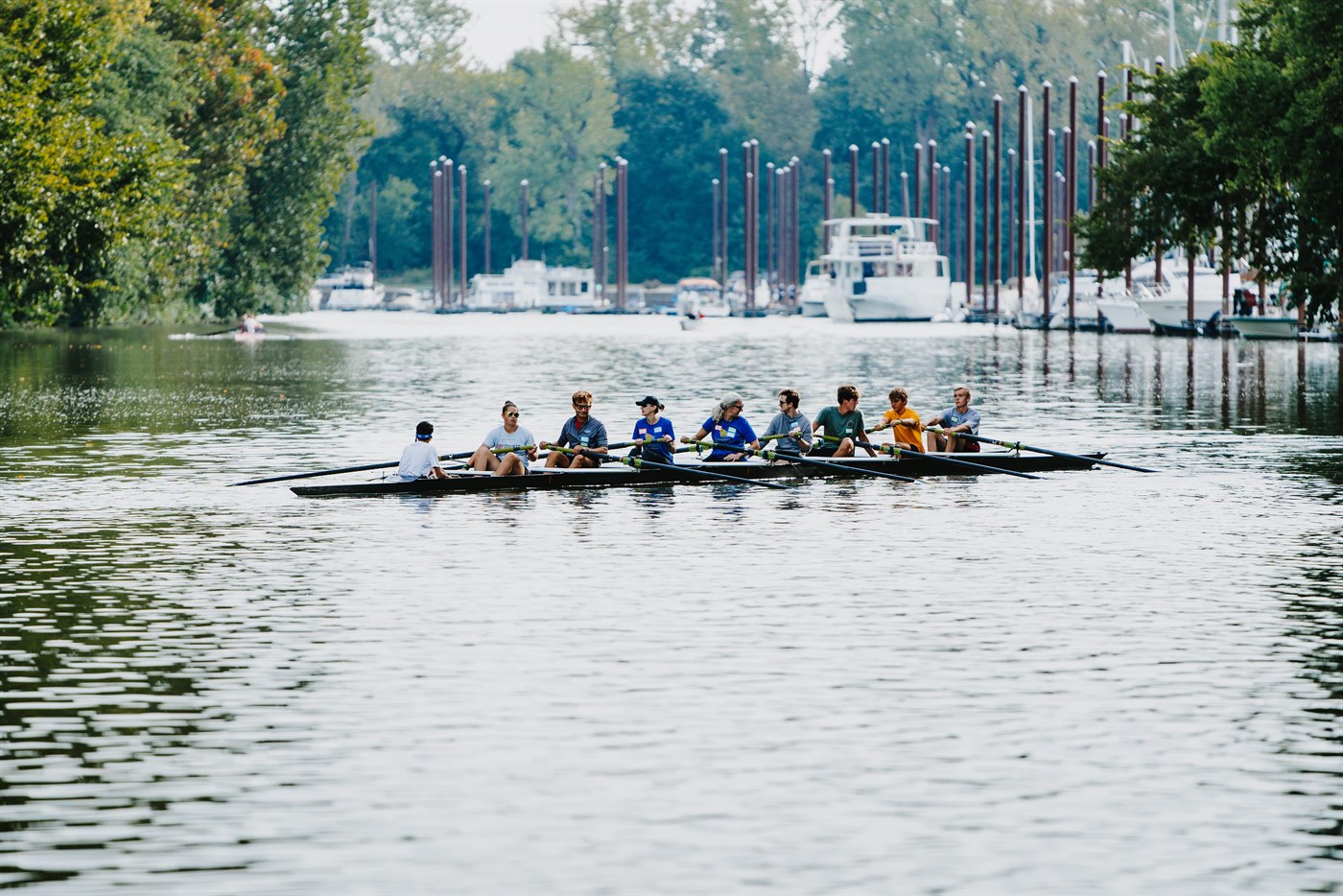 A Louisville Rowing Club masters crew rowing on the Ohio River